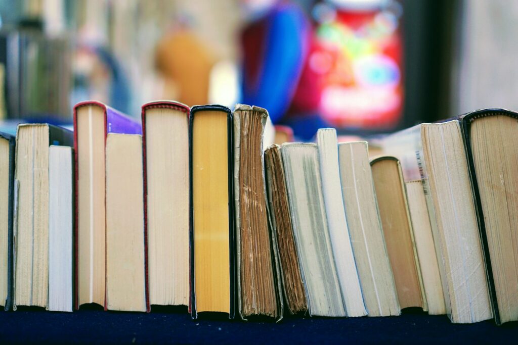 Top view of several books on a table.