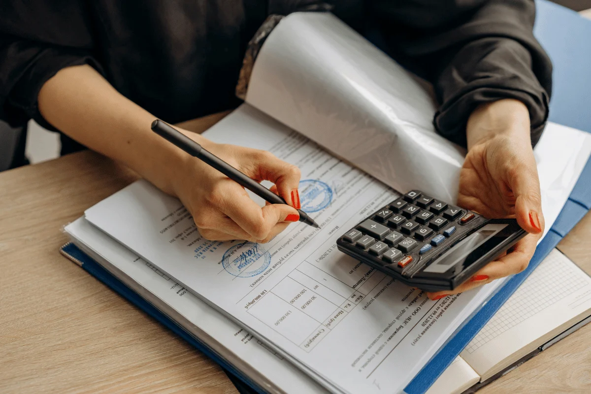Accounting and financial planning with organized files and tools.
